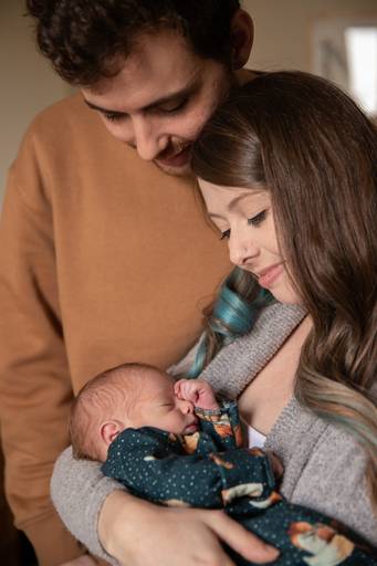 Fotografia de Pais de primeira viagem com newborn 