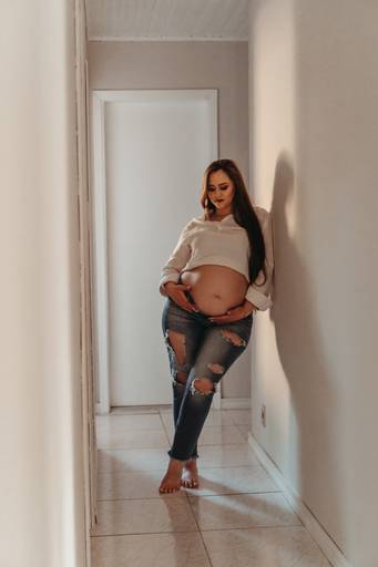 Ensaio de gestnate feito em casa