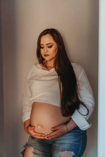 Ensaio de gestnate feito em casa