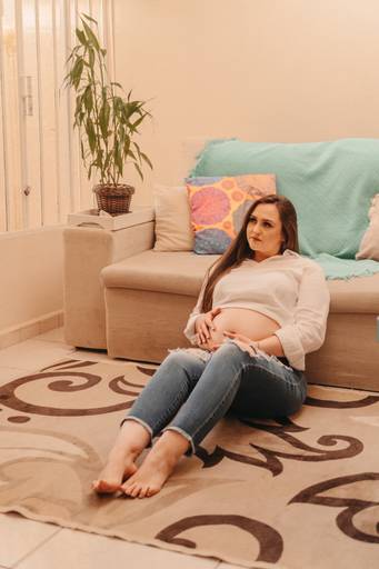 Ensaio de gestnate feito em casa