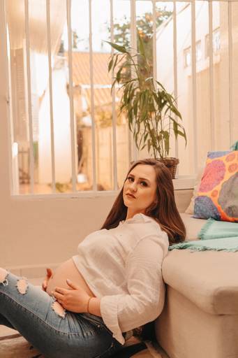 Ensaio de gestnate feito em casa