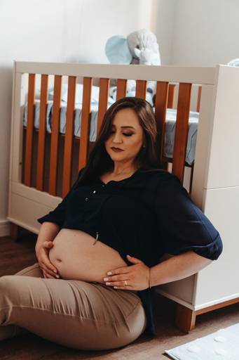 Ensaio de gestnate feito em casa