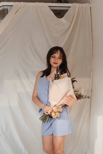 Ensaio de 15 anos boho delicado em casa