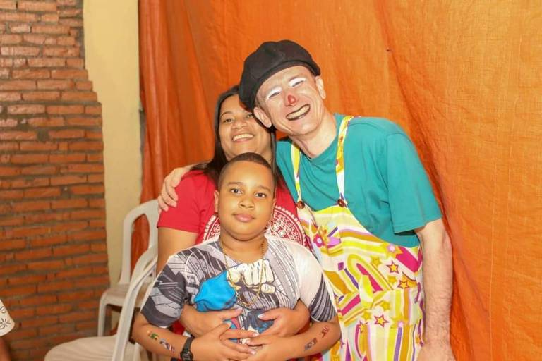 Foto com um fã em seu aniversário. 